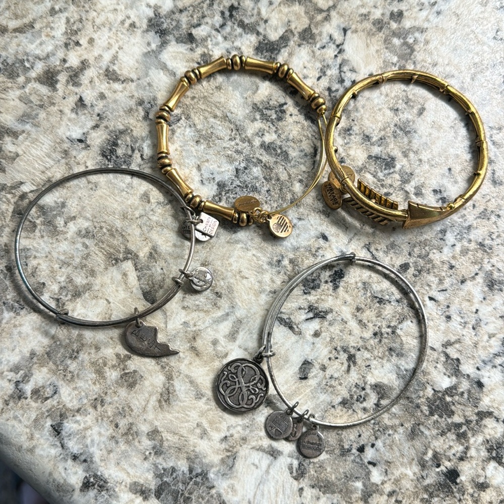 Assorted Alex and Ani bracelets. Sold together